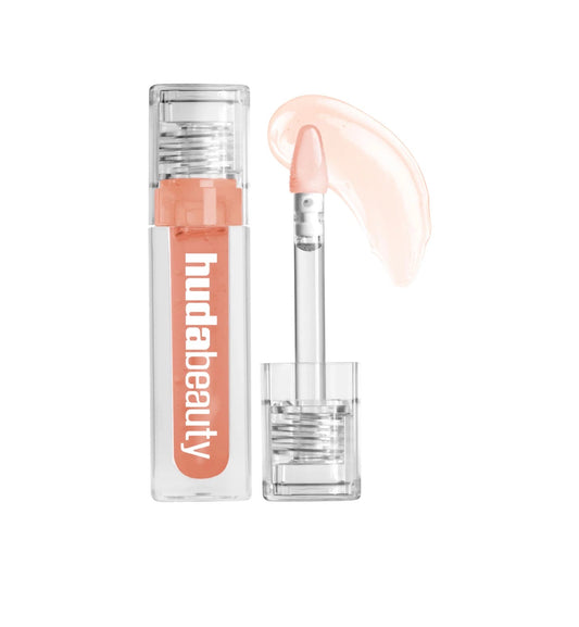 Huda Beauty
Faux Filler Jelly Oil — زيت/غلوس شفاه يعطي لمعة وترطيب وتأثير امتلاء للشفايف.
الحجم 3.9 ml